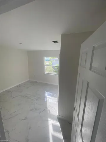 View of tiled empty room