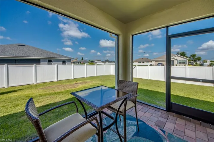 Screened lanai with decorative pavers
