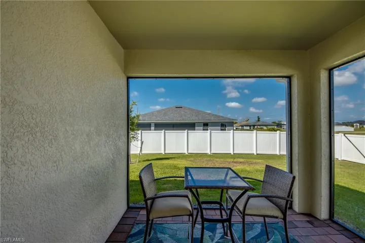 Screened lanai with decorative pavers