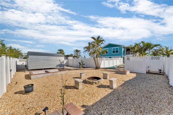 View of yard featuring a fire pit
