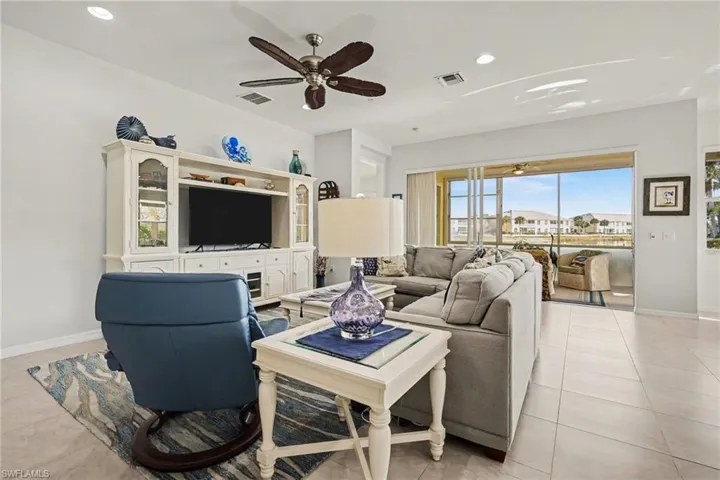 Nicely appointed living room space with gorgeous views of the lake.