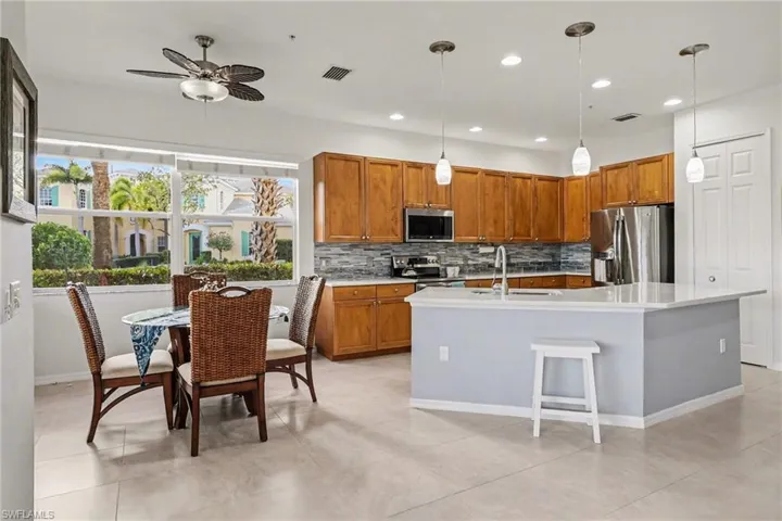 Kitchen featuring stainless steel appliances and gorgeous new quartz countertops