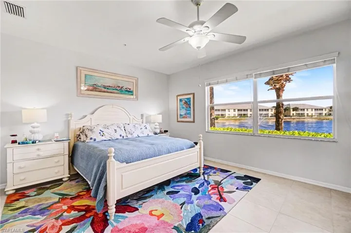 Primary bedroom with phenomenal lake views.