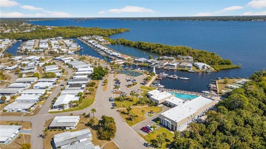 Aerial perspective of marina, clubhouse, pool and recreation