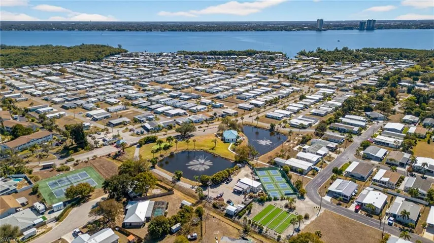 Aerial view of residential area with a large body of water