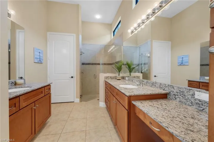 Dual sinks and large shower.