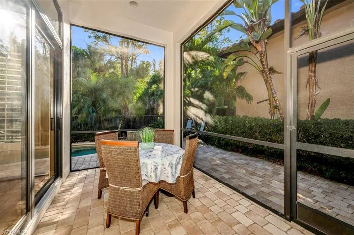 screened lanai overlooking the pool and preserve.