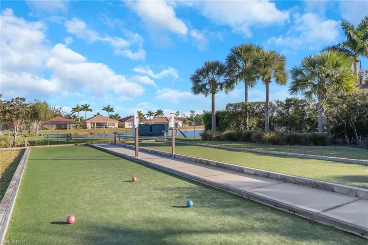 View of home's community featuring a residential view and a game area