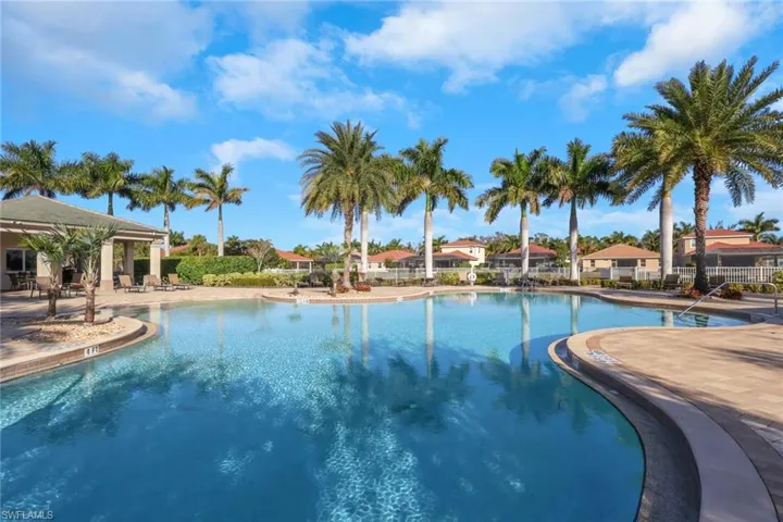 Community pool featuring a patio area
