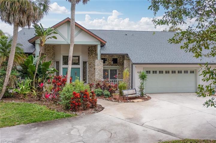 2 car garage, covered entry, double doors, new roof, large driveway with plenty of parking, landscape all around