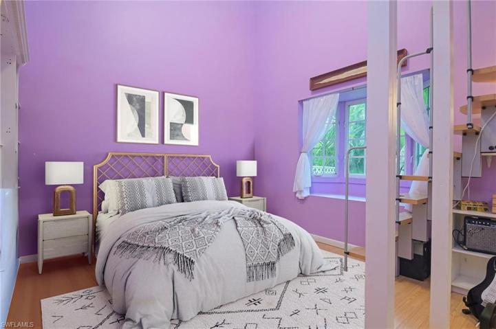 middle bedroom with Rapunzel loft area - virtually staged