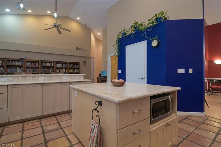 Bar area and second living space for entertaining, walk-in pantry, dining area is just off the kitchen