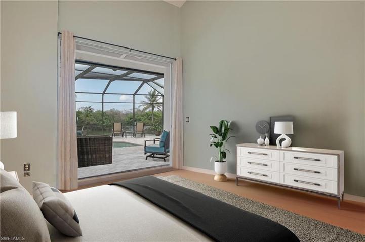 Primary bedroom with pocket sliders- virtually staged
