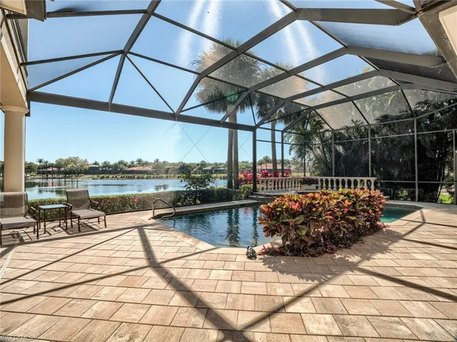 View of lake through picture window screen
