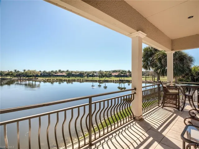 Balcony with a water view and 6th and 7th North course greens and fairways