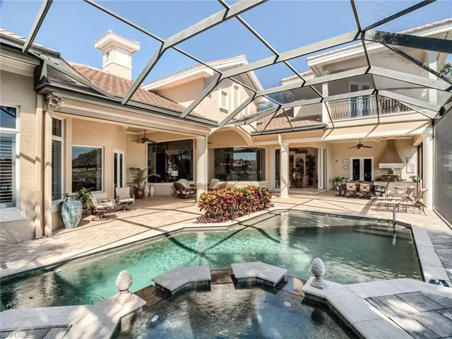 View of pool area with sun pad