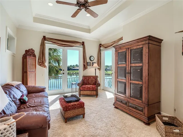 2nd floor leisure room (could be used as bedroom) with ceiling fan, French doors opening to balcony with incredible views