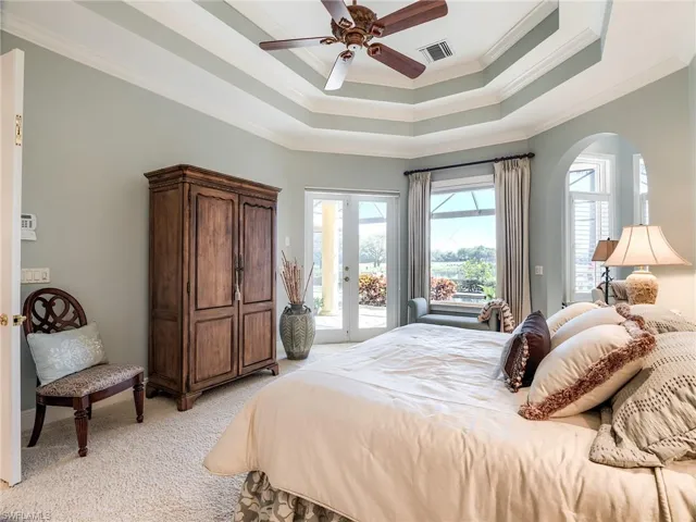 Bedroom featuring French doors access to lanai