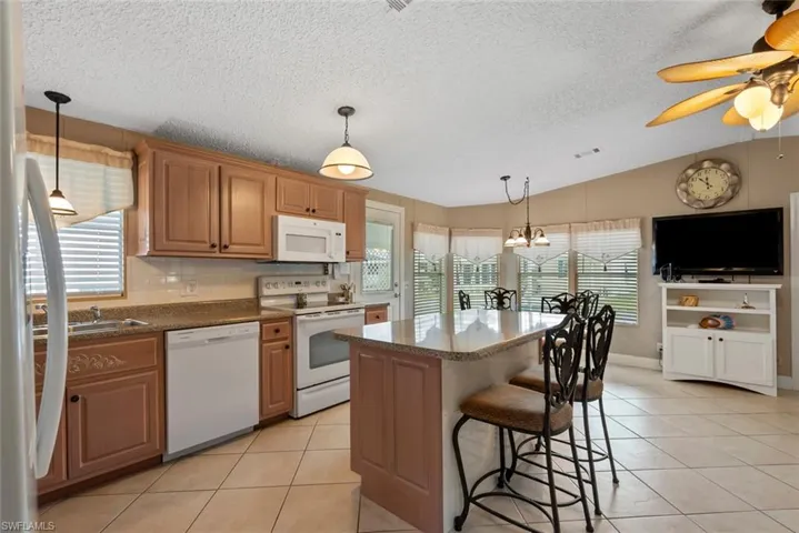 Kitchen with white appliances