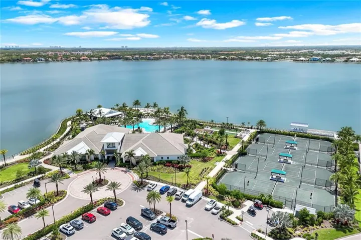 Aerial view of a nearby body of water and a pool
