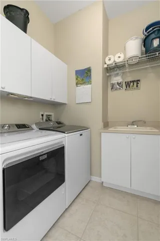 Inside Laundry room with utility tub