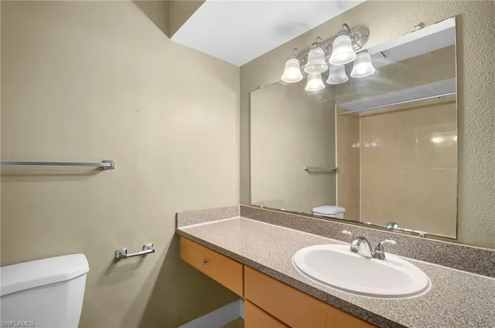 Bathroom featuring toilet and vanity