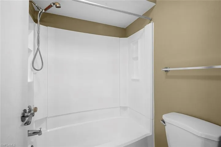 Full bath with bathtub / shower combination and toilet