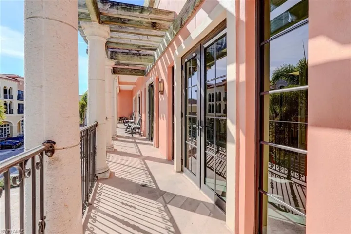 Balcony featuring french doors