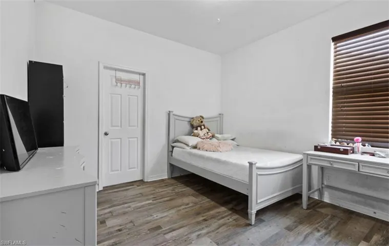 Bedroom featuring hardwood / wood-style flooring