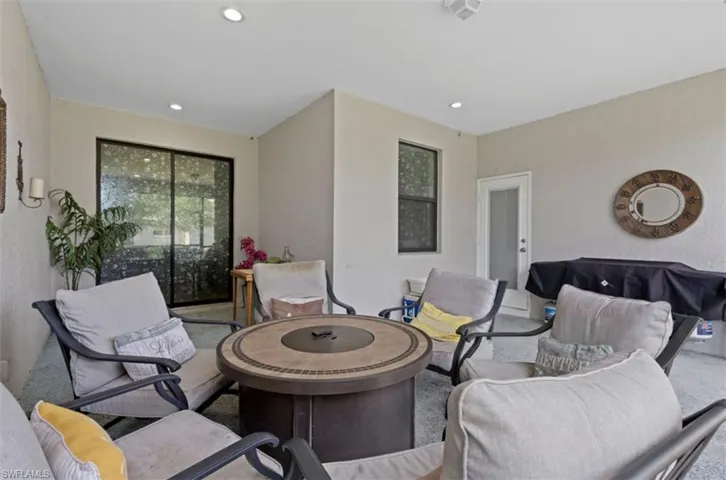 Living room featuring carpet floors