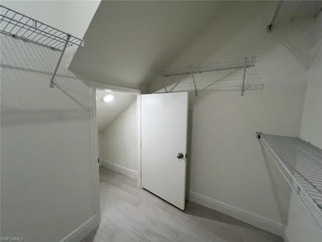 Spacious closet featuring light wood finished floors