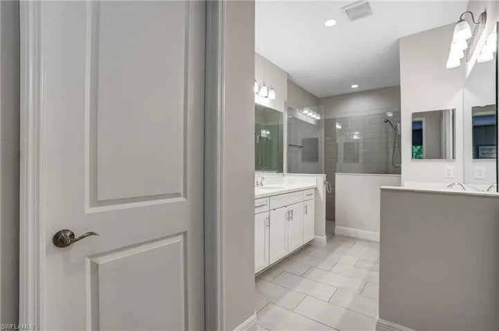 With Double Large His & Hers Walk in Closets
