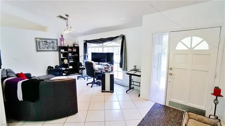 Office featuring light tile patterned floors
