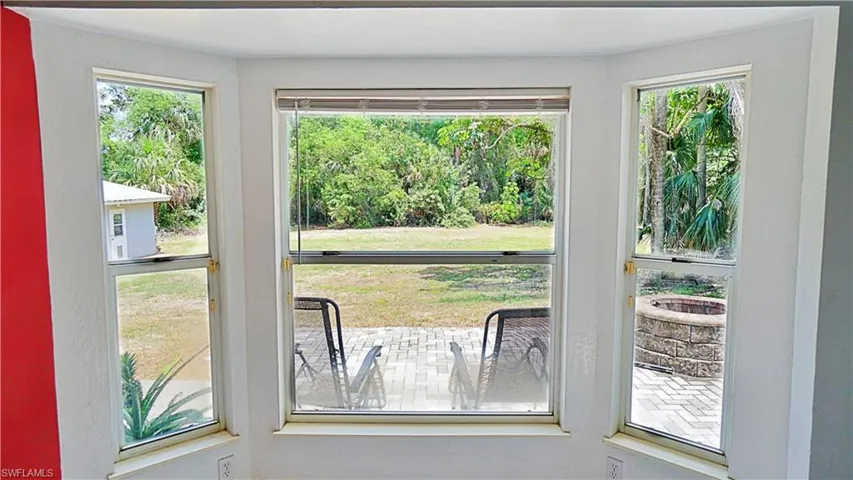 Doorway to outside featuring healthy amount of natural light
