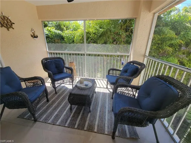 Sunroom / solarium featuring healthy amount of natural light