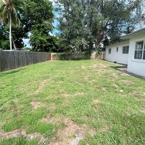 View of fenced backyard