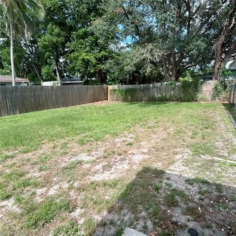 View of fenced backyard