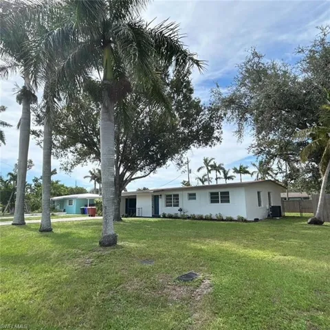 View of front of property featuring stucco siding