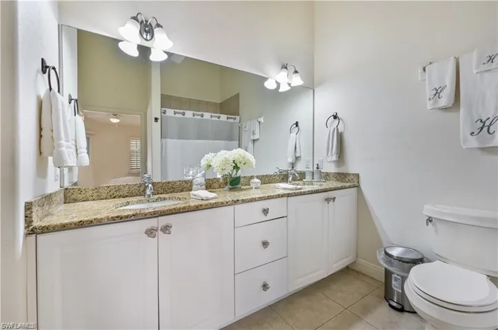 primary bath walk in shower dual sinks