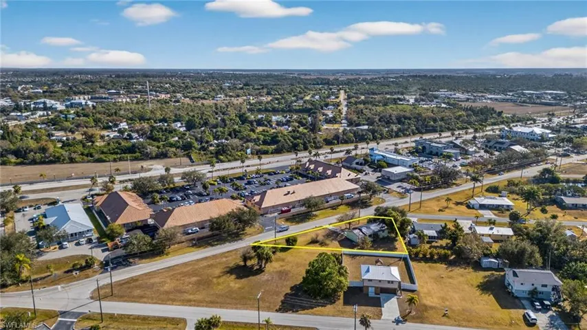 Aerial view of property's location featuring property parcel outlined