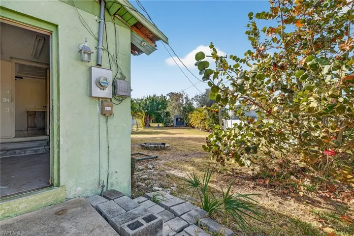 Exterior view of stucco siding and electric meter