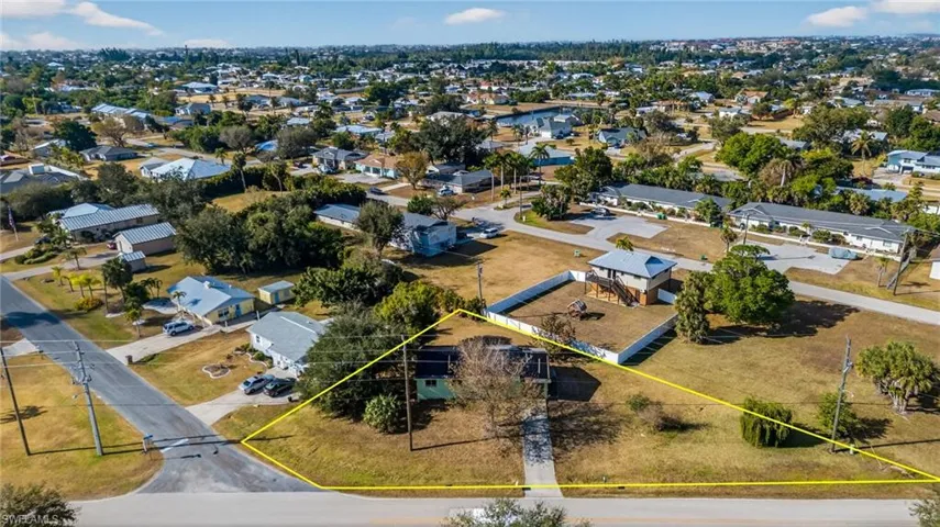 Aerial perspective of suburban area with property boundaries highlighted