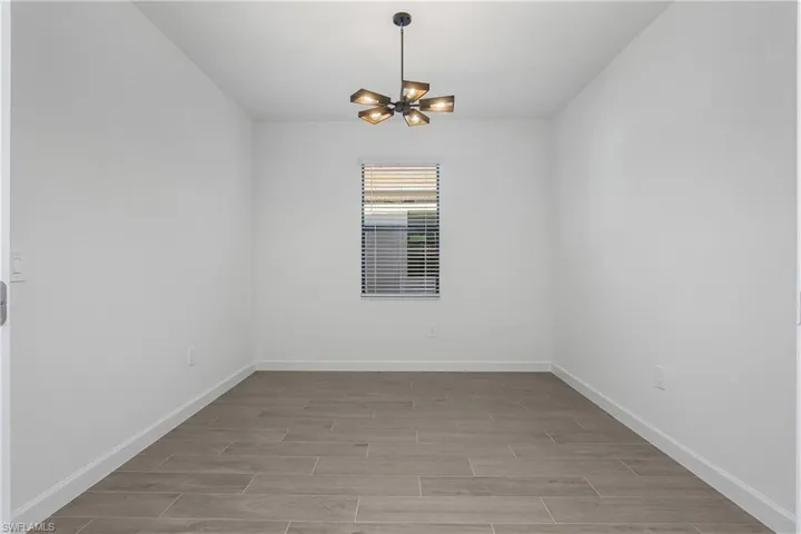 French doors leading to spacious home office/den.