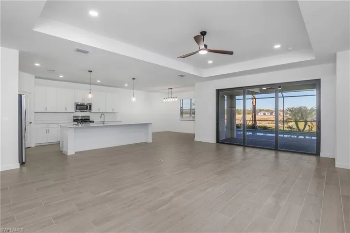 Open living, kitchen and dining area all overlook your private pool/spa and stunning water views.