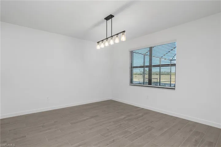 Enjoy family dining in this open floor plan.