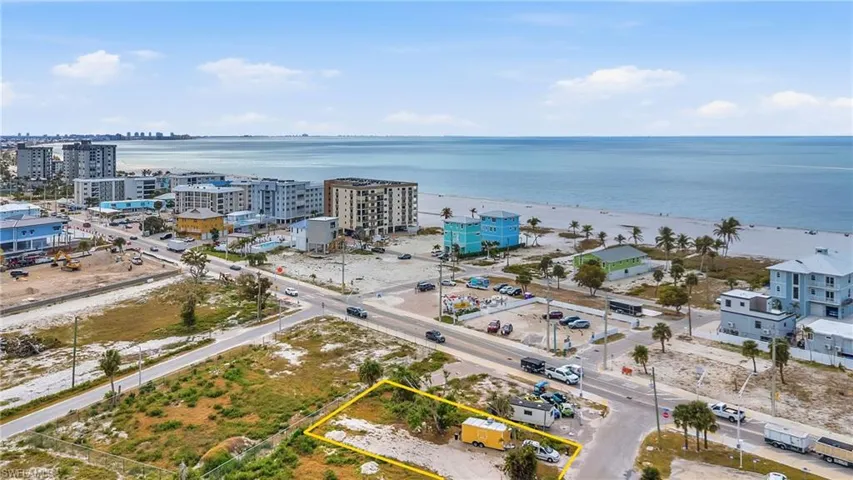 View of property location with property boundaries highlighted and a nearby body of water