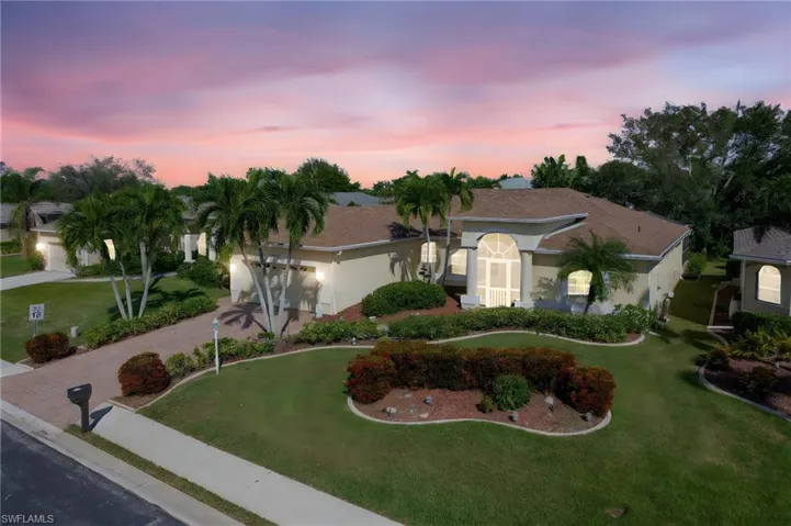 View of front of home with a yard
