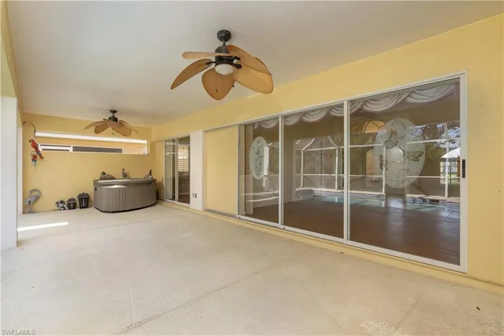 View of patio with ceiling fan