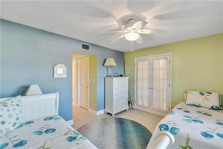 French doors lead you in and hallway closet is a walk-in