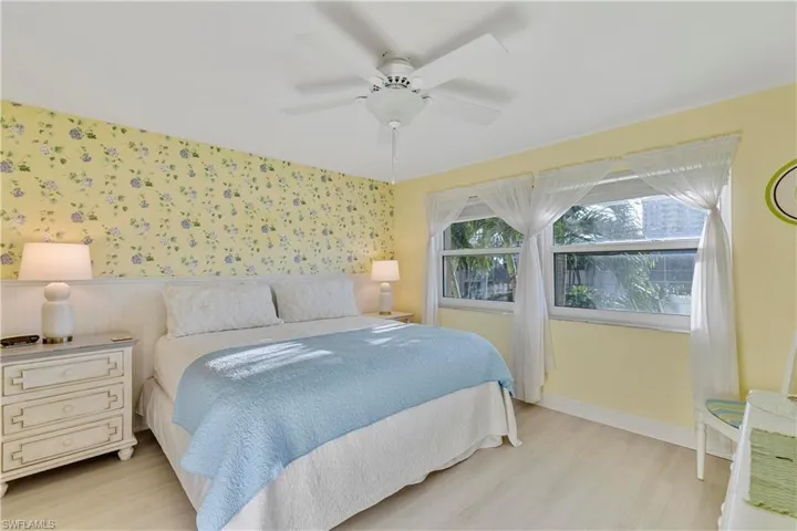 Spacious primary bedroom with King sized bed